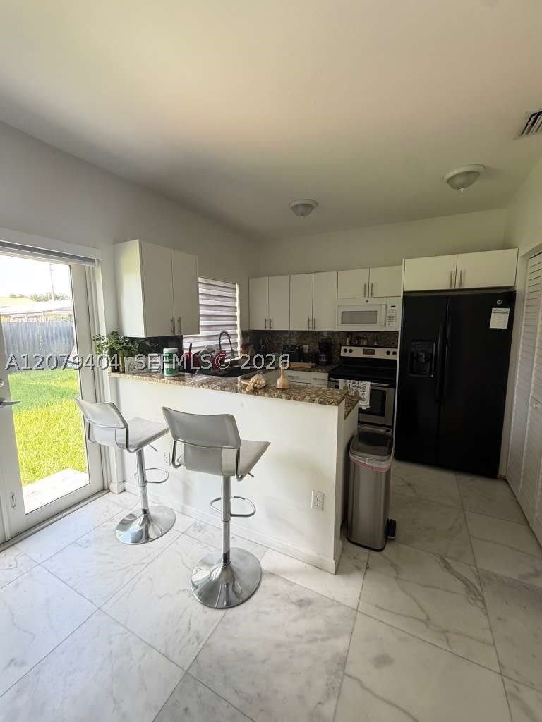 8880 SW 25th St – photo 4