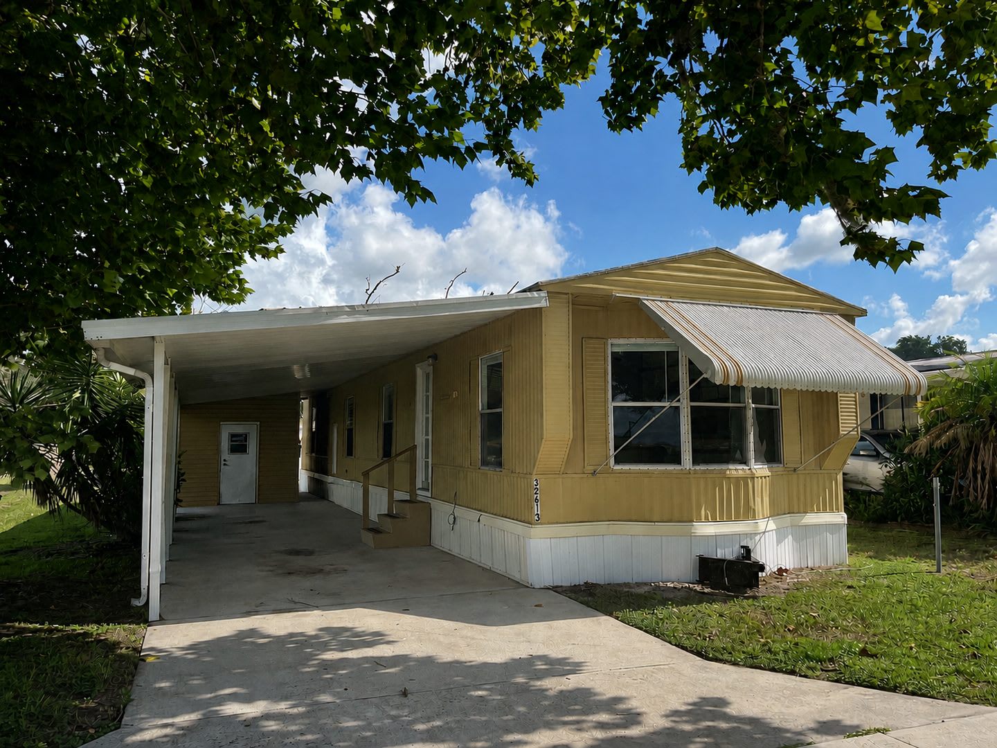 2BR/1BA Wesley Chapel Mobile Home w/ Carport – Utilities Included! – photo 1