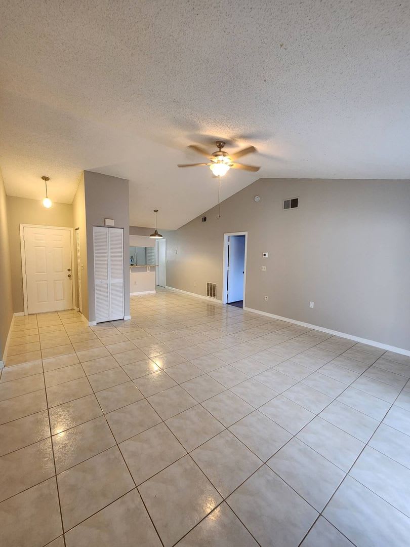Move-In Ready Poinciana Gem with a Brand-New Kitchen & Screened Porch! – photo 3