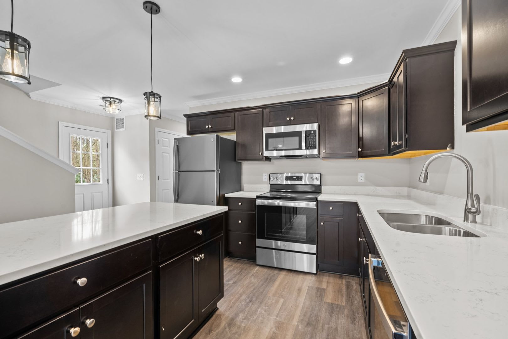 Fall in Love with the Kitchen Island in this Newley Built Home 2022 – photo 5