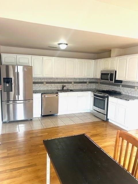 93 Western Ave – photo 2