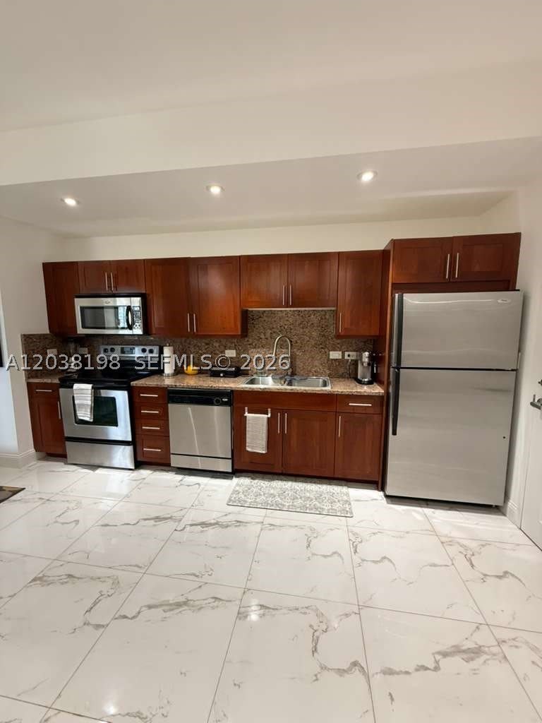 111 E Flagler St – photo 3
