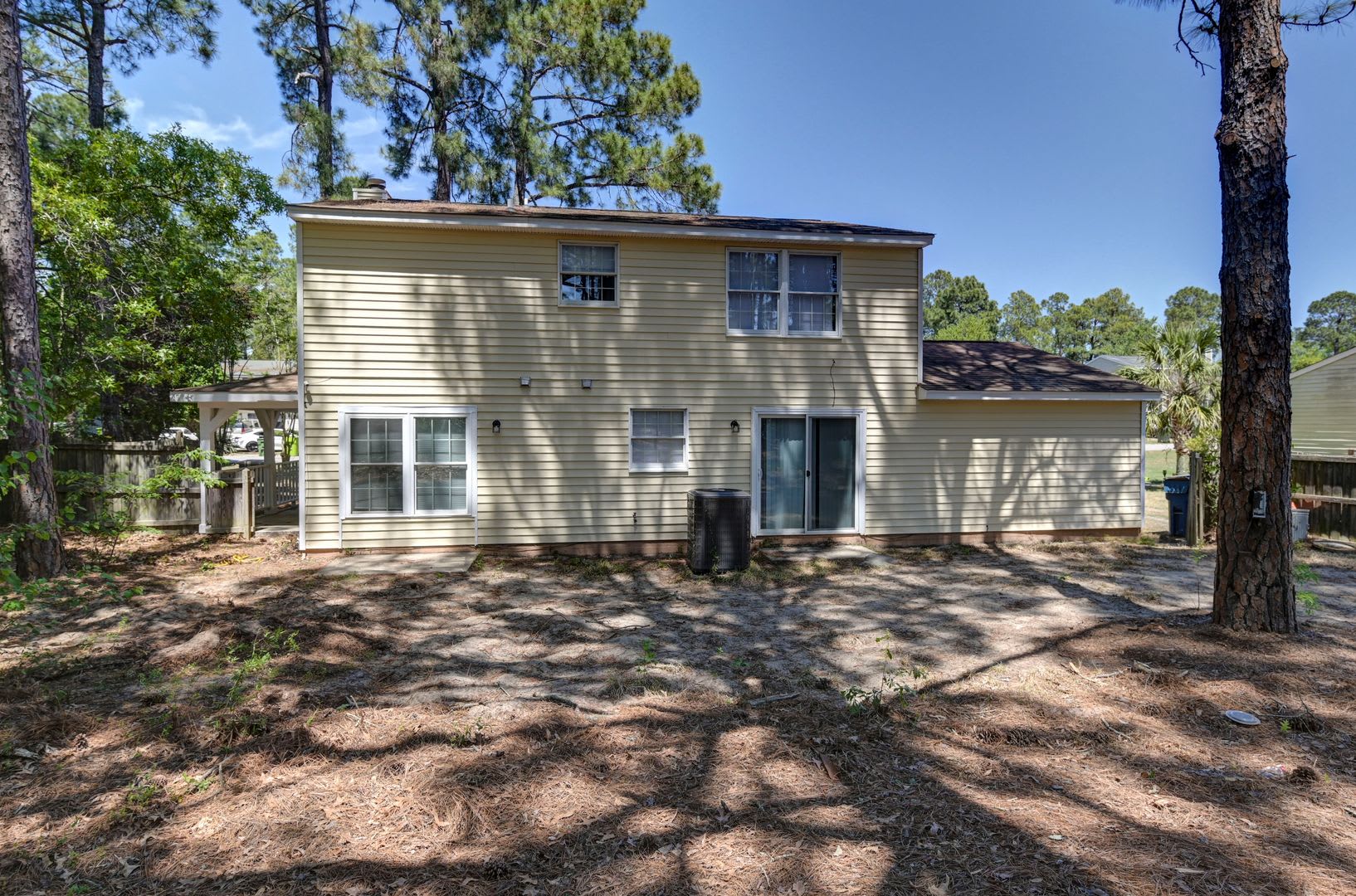Spacious 3BR Home with Covered Front Porch & Expansive Backyard Near Dining & Shopping – photo 3