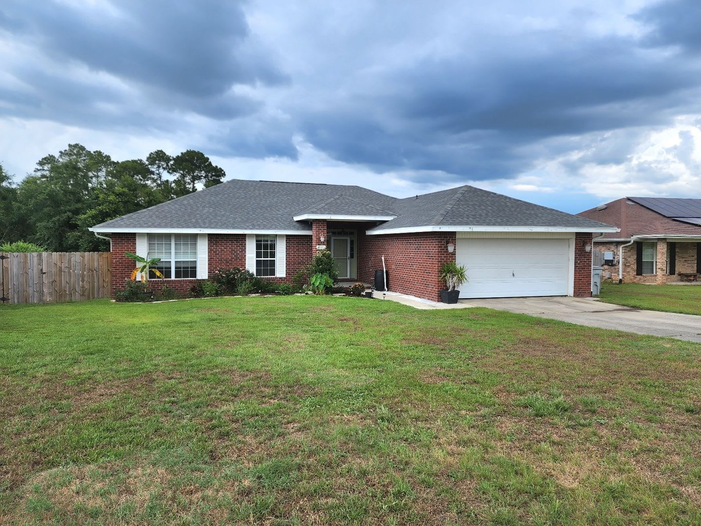 Adorably Styled and Updated 4 bedroom 2 bath Brick home located in Pace Community of La Floresta! – photo 2