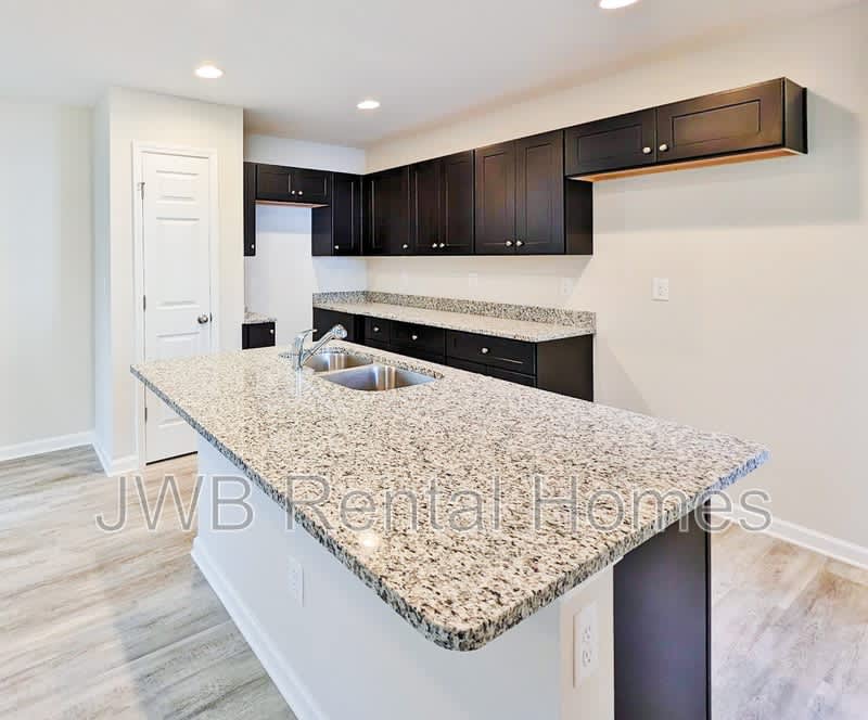 9075 Eaton Ave – photo 2
