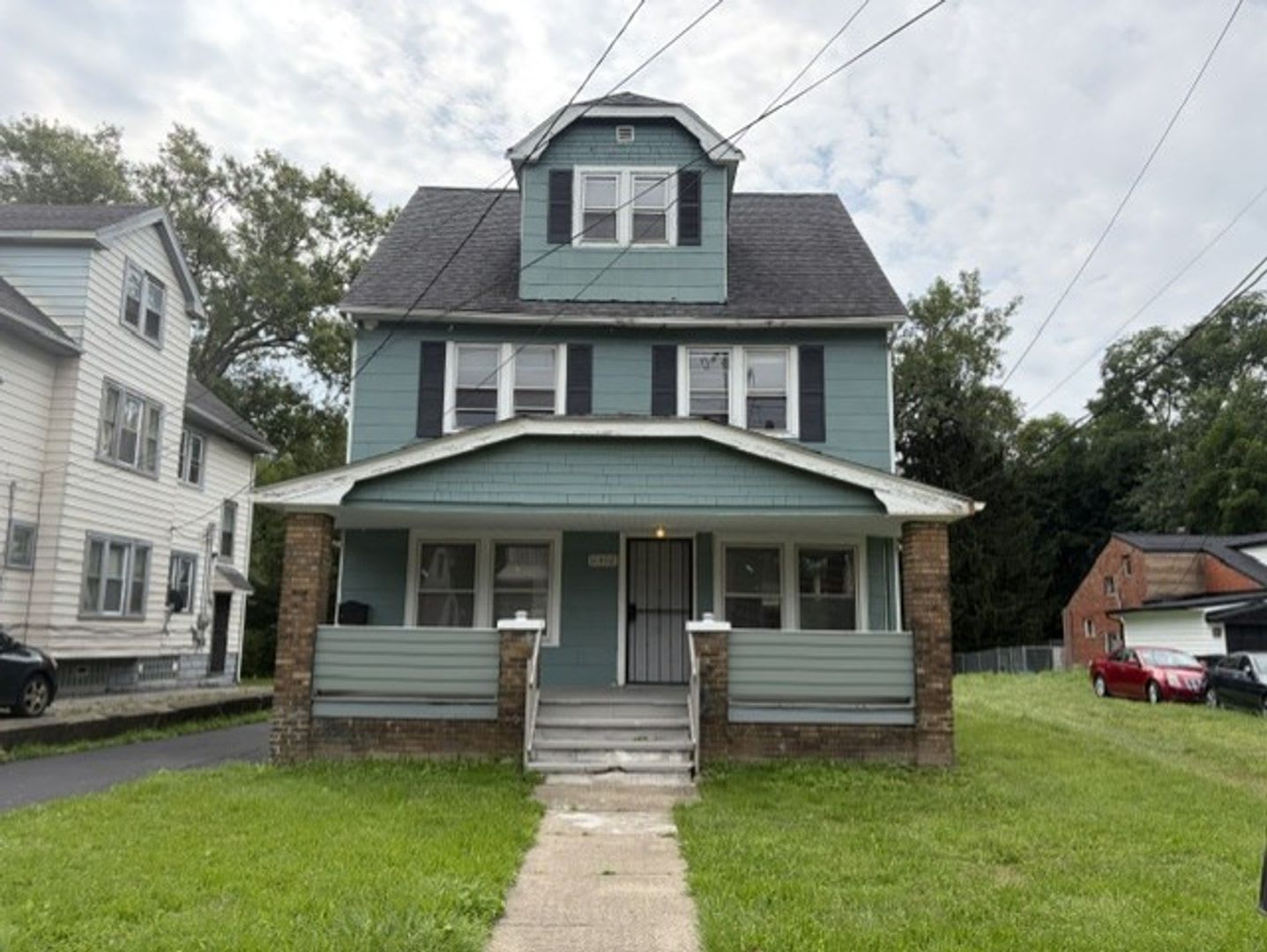 Must-See 5-Bedroom Home with a Large Kitchen, Two Full Bathrooms and Updated Driveway – photo 1