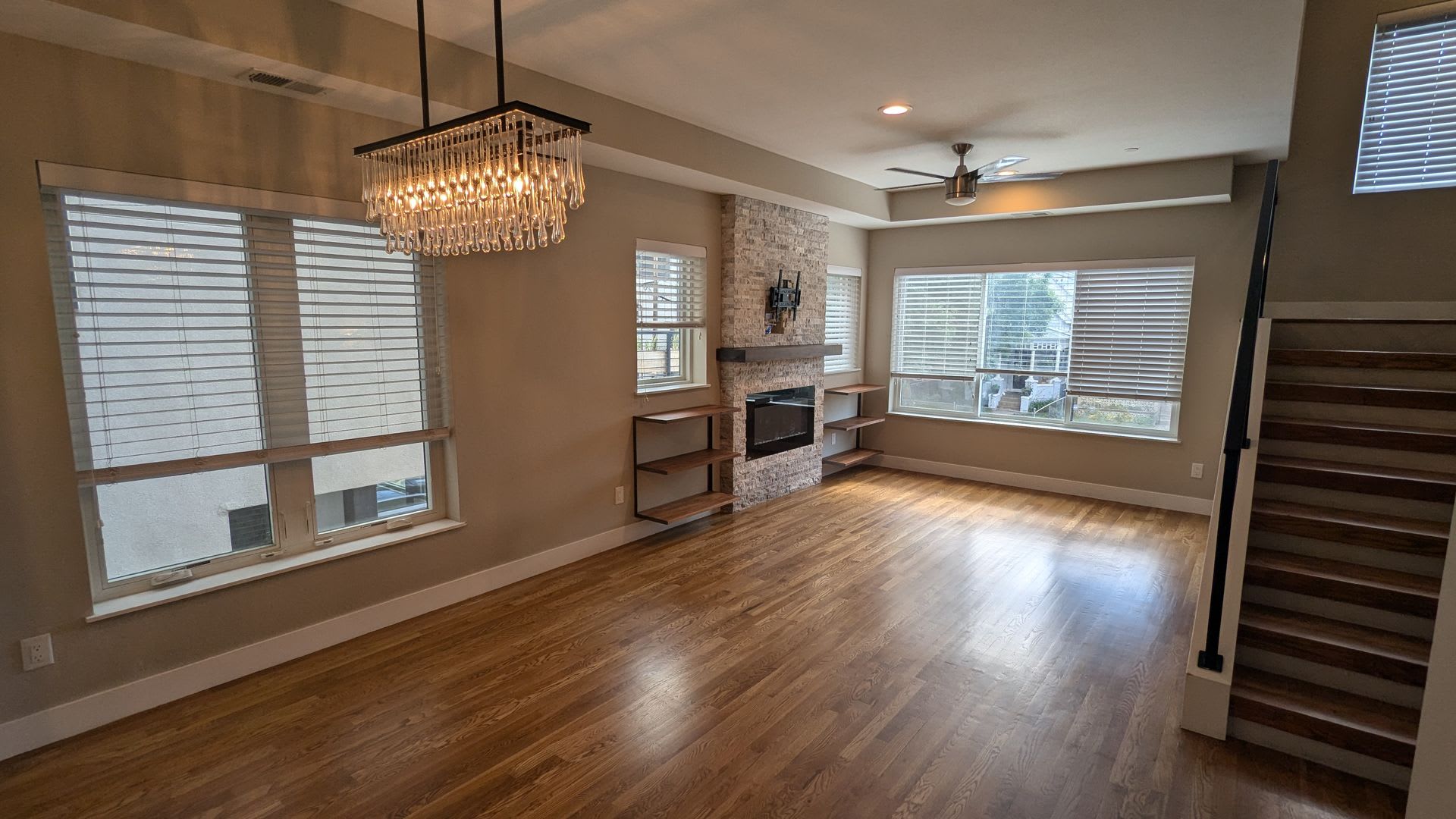 STUNNING 4-LEVEL TOWNHOME IN HIGHLANDS W/ 2-CAR GARAGE +AMAZING ROOFTOP DECK WITH VIEWS! – photo 3
