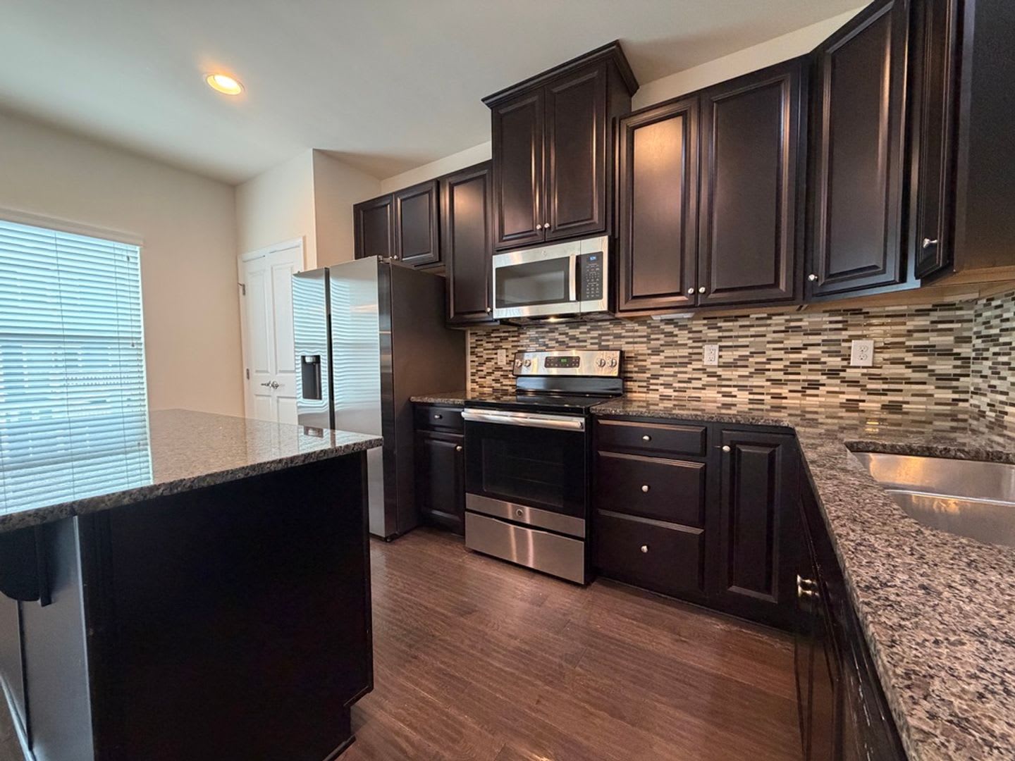 Wow! Beautiful 3 bedroom, 2 1/2 bath townhouse style home. – photo 3