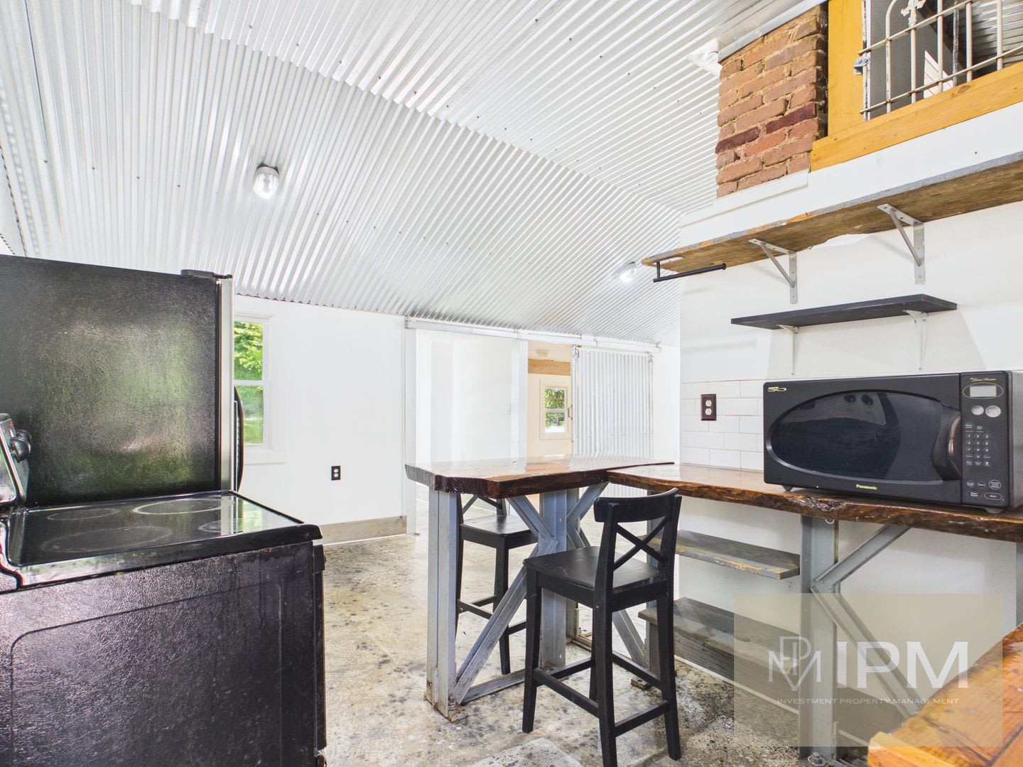 Unique Industrial-Style 2-Bedroom Home with Loft Space – photo 4