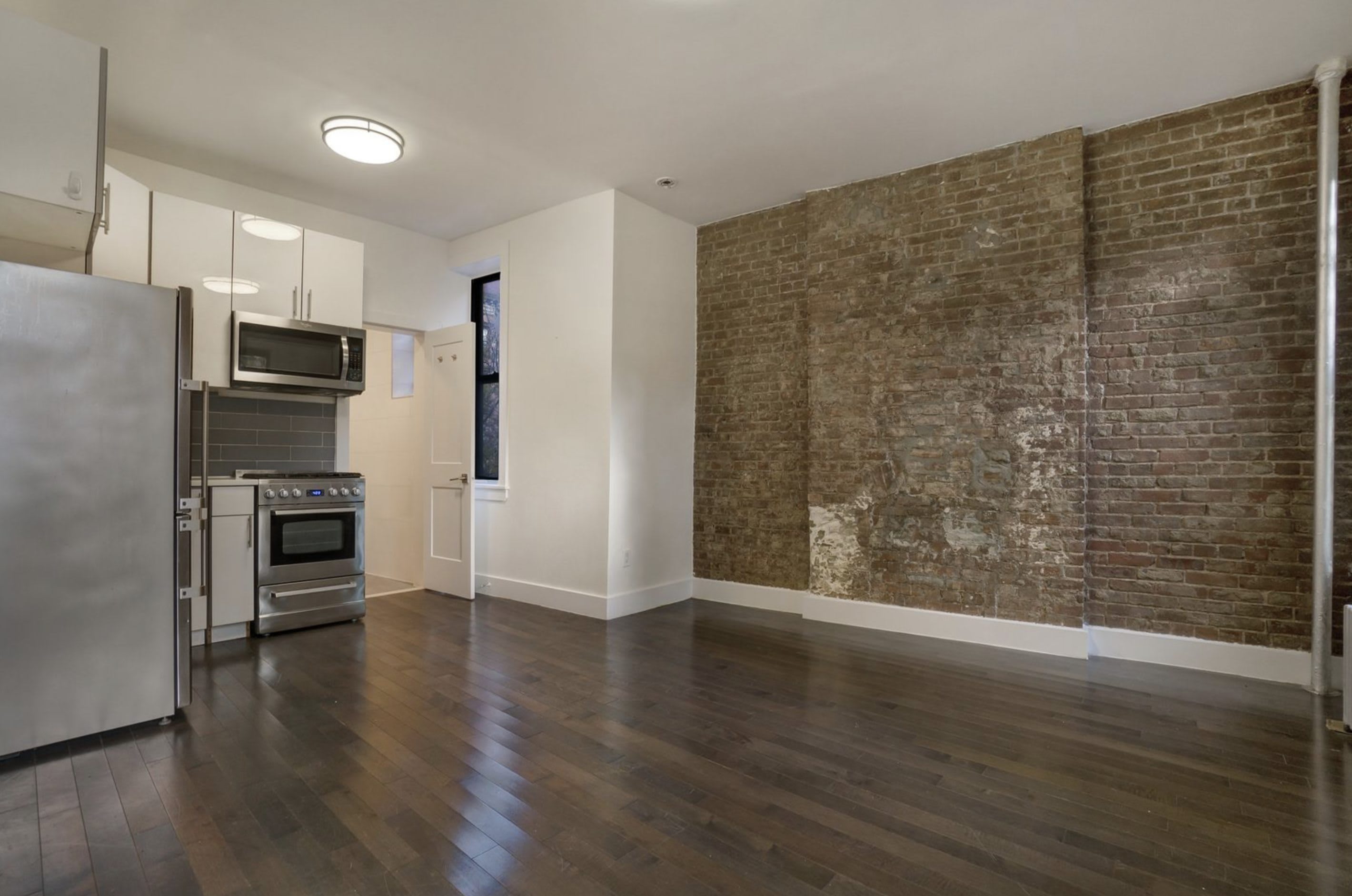 66 E 1st St – photo 1