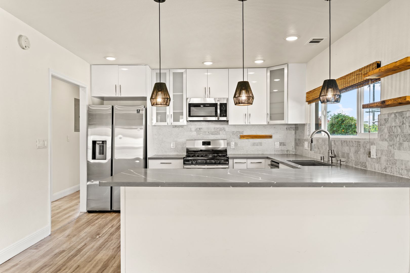 Beautifully Updated Spanish-Style Home Featuring an En Suite Master and Redwood Deck – photo 4