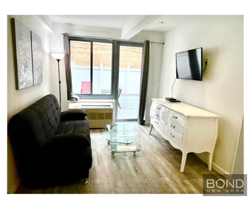 521 West 48th Street – photo 2