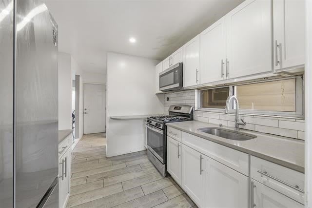 906 76TH ST – photo 4