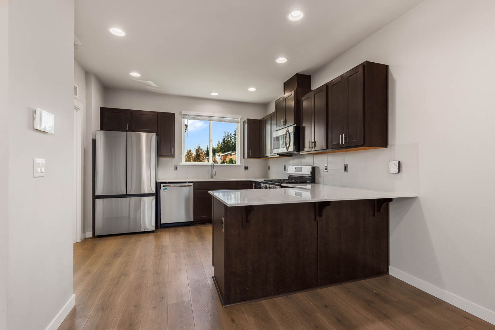 Modern Northshore Townhome with Designer Finishes & 2-Car Garage – photo 4