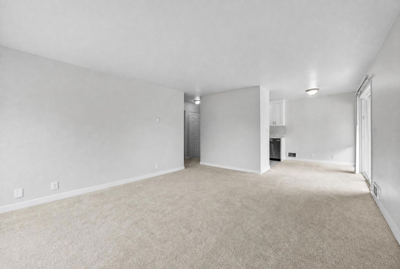 Fully Renovated Sun-Filled Downtown Bellevue Condo with Dual Balconies & Prime Walkable Location – photo 3
