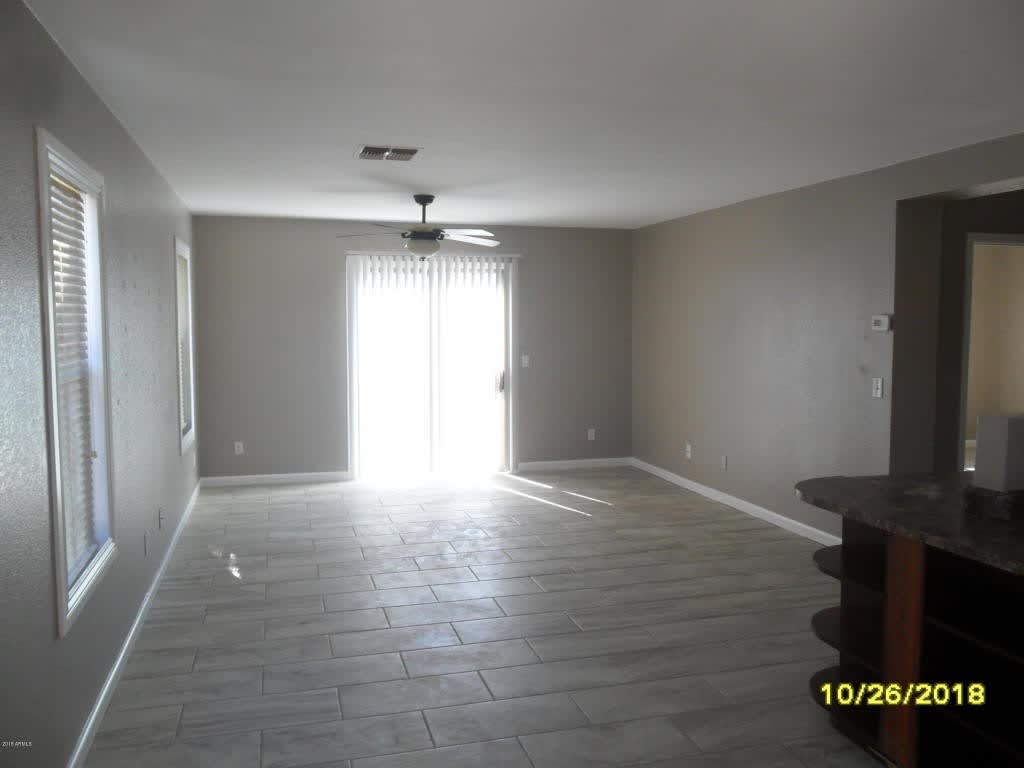 El Mirage Home with Tile Flooring Throughout – photo 2