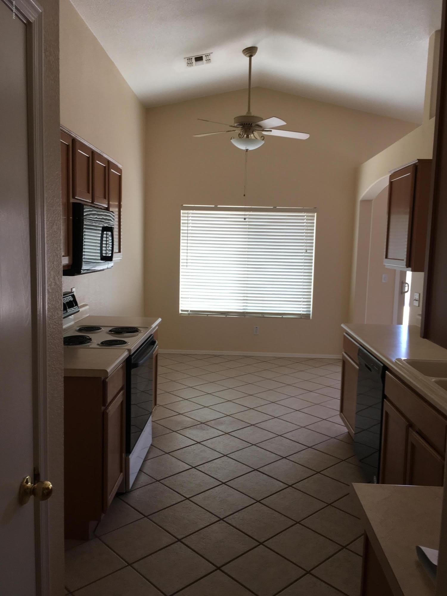 7911 W School Hill Place – photo 4