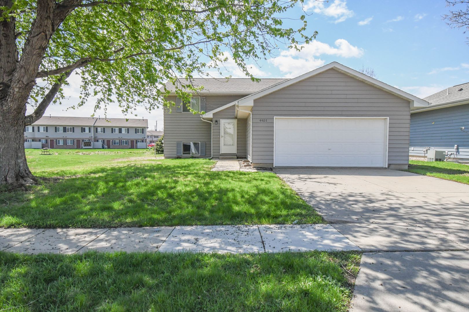 Updated 3BR Split-Level Home with Huge Deck, Fenced Yard & 2-Car Garage Near I-29! – photo 1