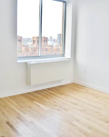 393 W 25th St – photo 2