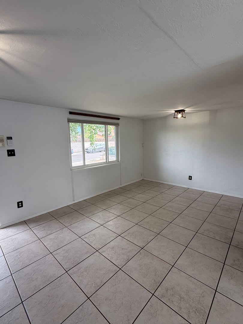 Pride of Ownership beams from this NE Heights 3 Bedroom 1.5 Bath home – photo 2