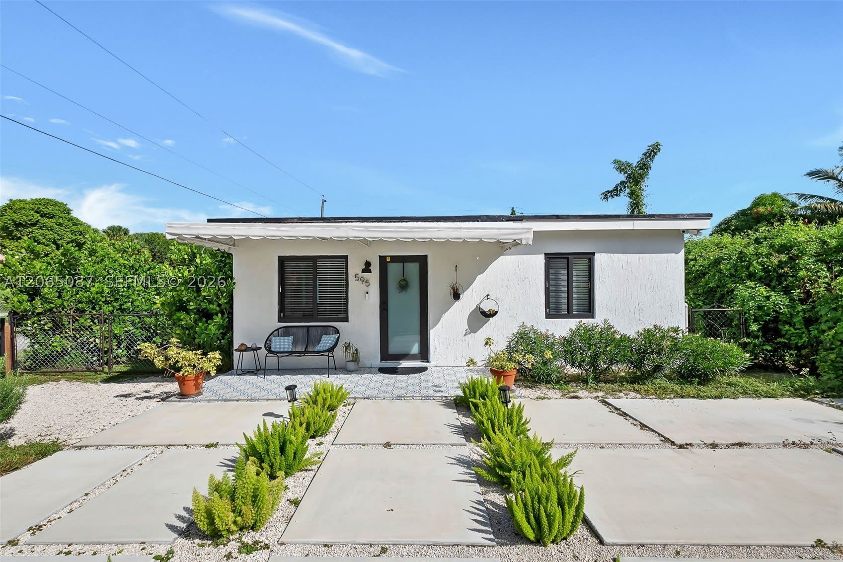 595 Nw 101St St – photo 1