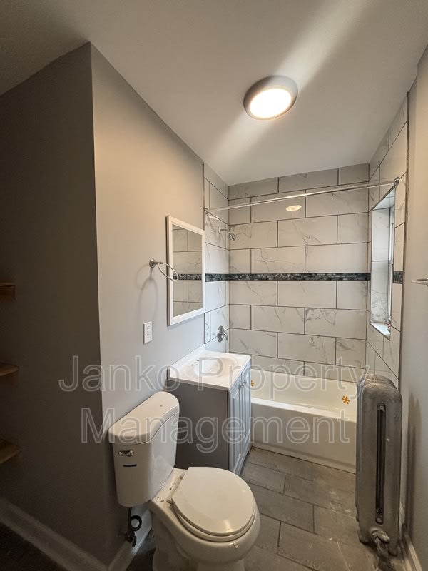 6055 S Troy St – photo 3