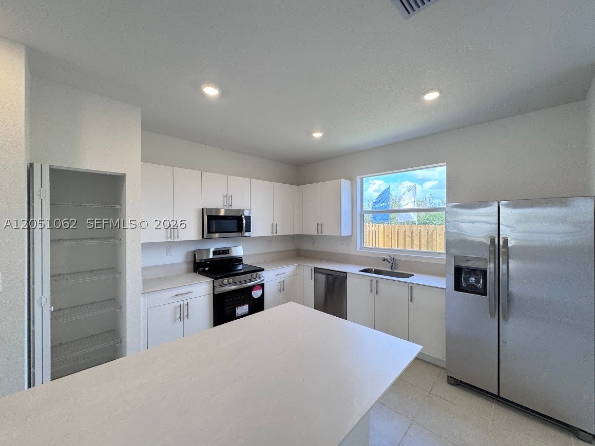 1182 SE Palm Ter – photo 5