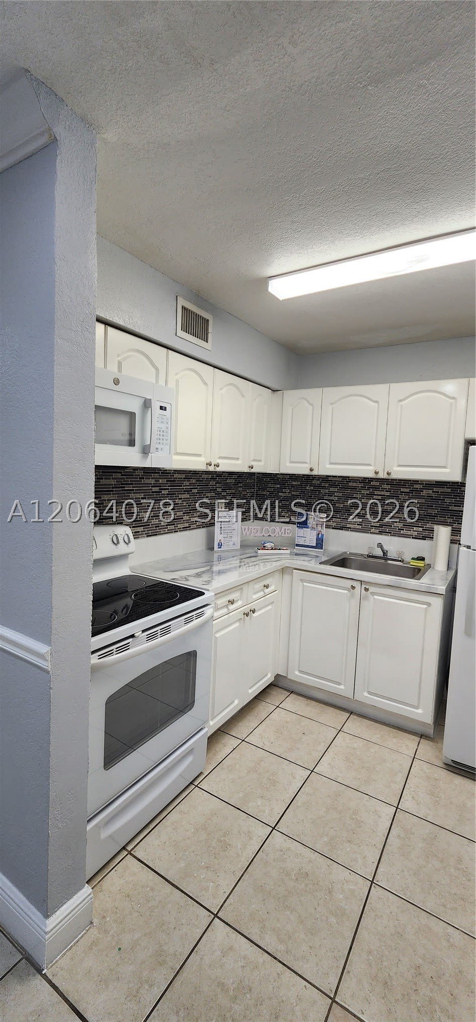9405 SW 76th St – photo 1