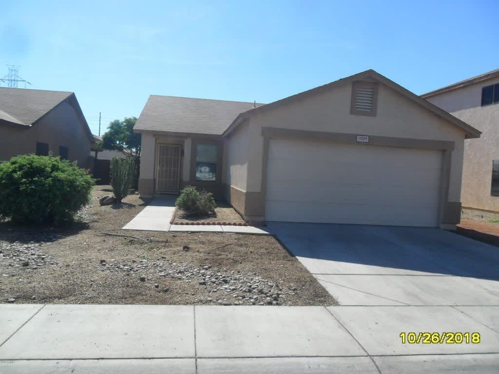 El Mirage Home with Tile Flooring Throughout – photo 1