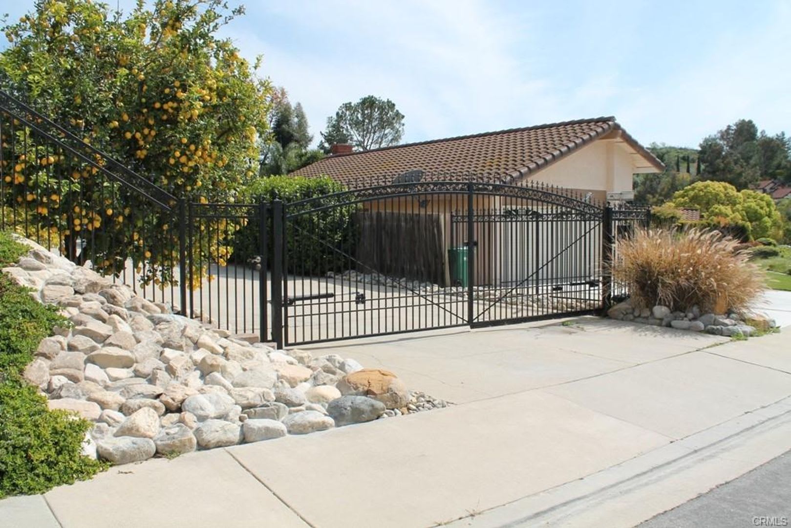 This incredible 4 bedroom single level home with private GATE entry – photo 2