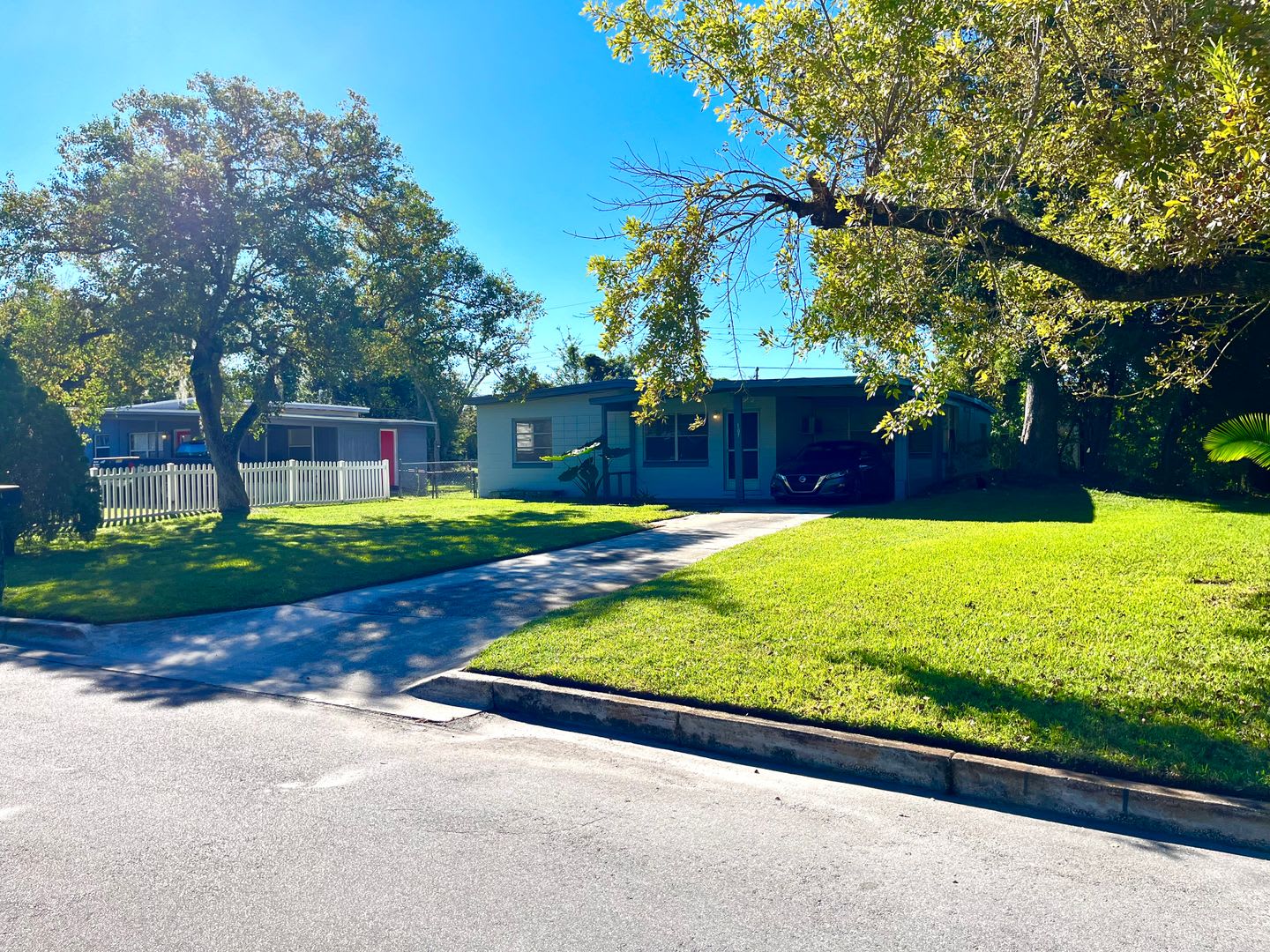 Lawn Service included with this 2BR/1BA w/Carport, Office, and Bonus Room – photo 1