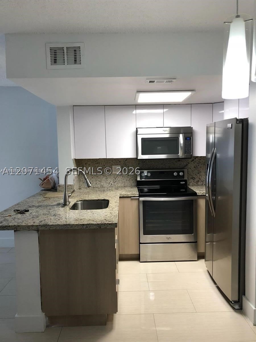8670 NW 6th Ln – photo 4