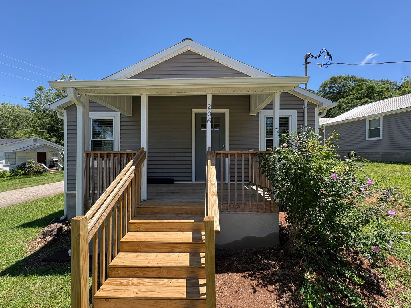 Modern Comfort Meets Small-Town Charm at 206 Hillcrest – photo 1