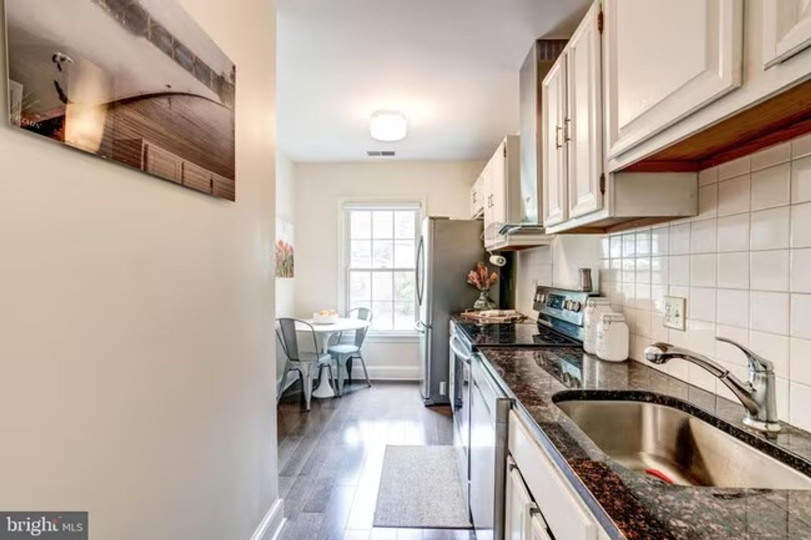 Sun-Drenched 2BR/2.5 BA Townhouse Condo in Gated Sutton Place – photo 5