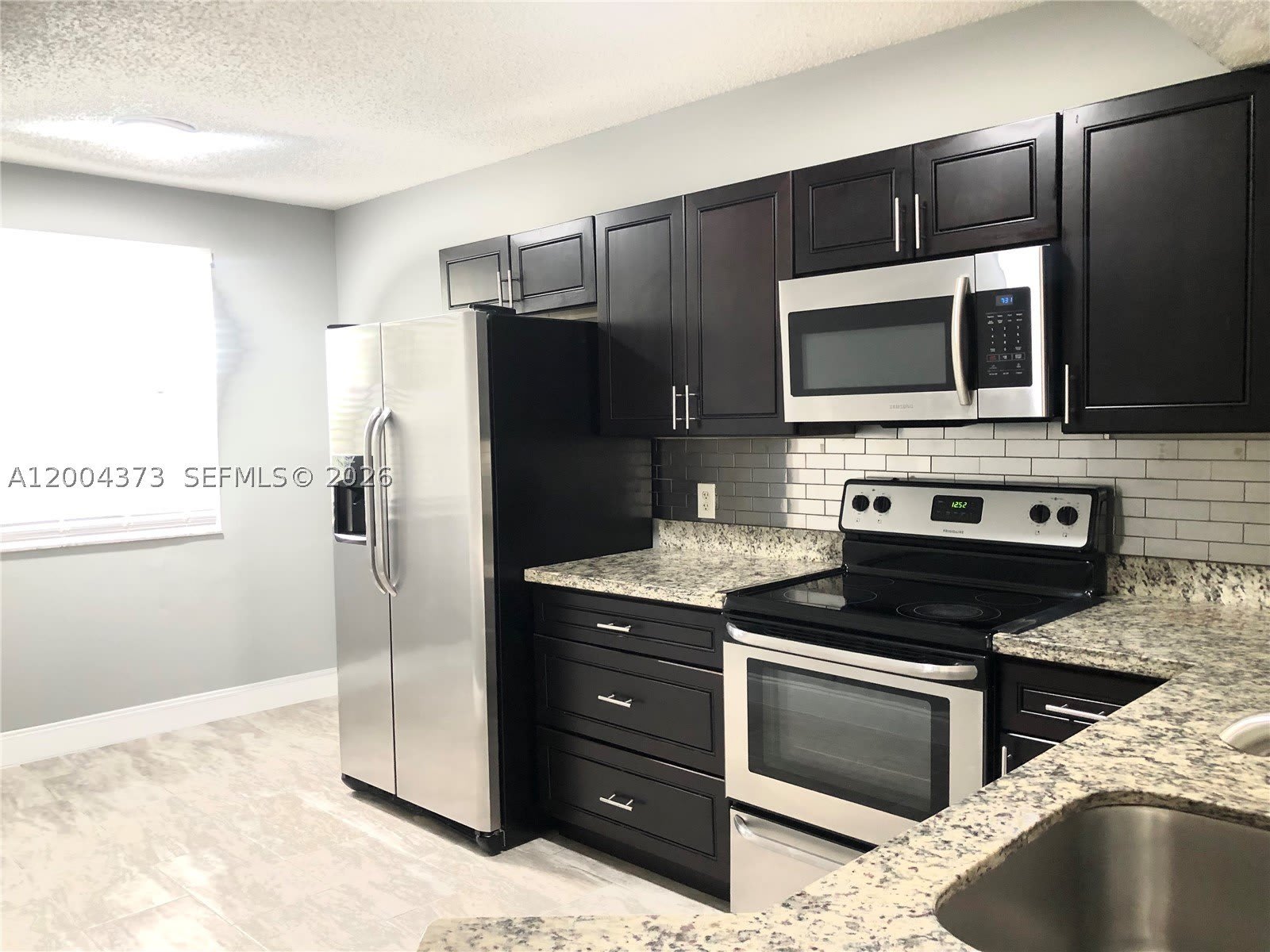 8761 Wiles Rd – photo 2