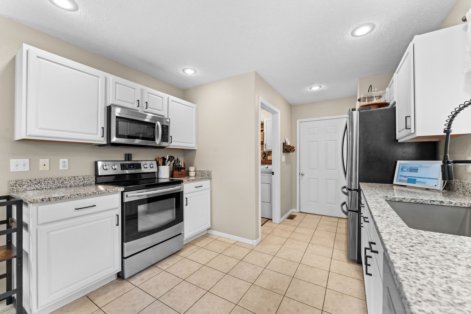 Beautifully Updated 3 Bedroom Home With 2 Baths 2 Car Garage With Fenced Yard – photo 4