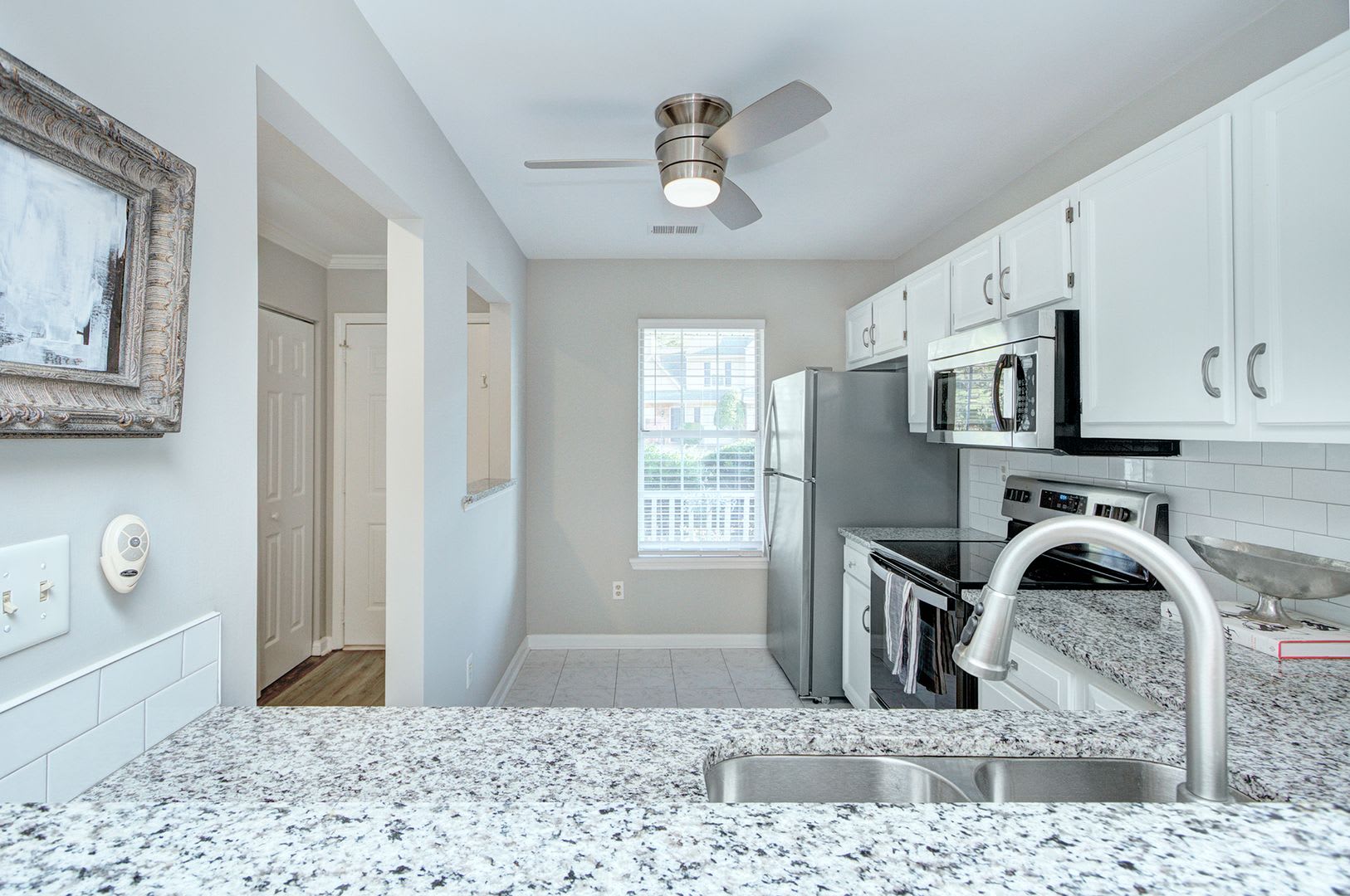Discover This Beautifully Updated Raintree Townhome Featuring An Open Floor Plan And A Range Of Contemporary Enhancements – photo 5