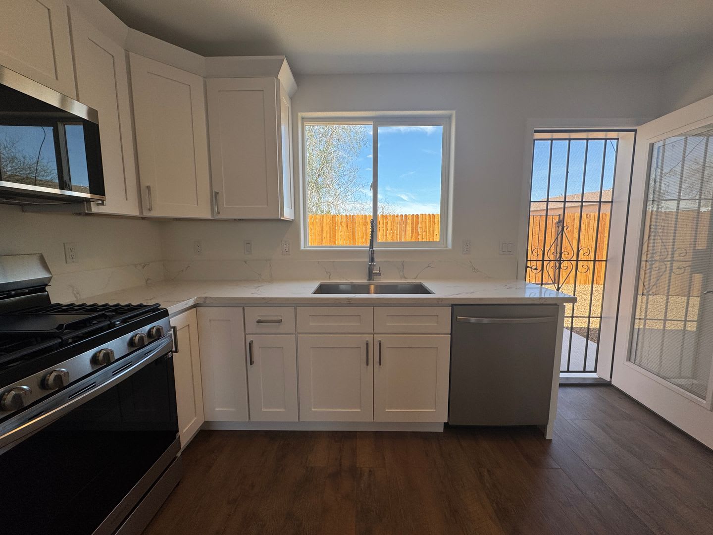 Brand New 2BR home with fenced yard – photo 5