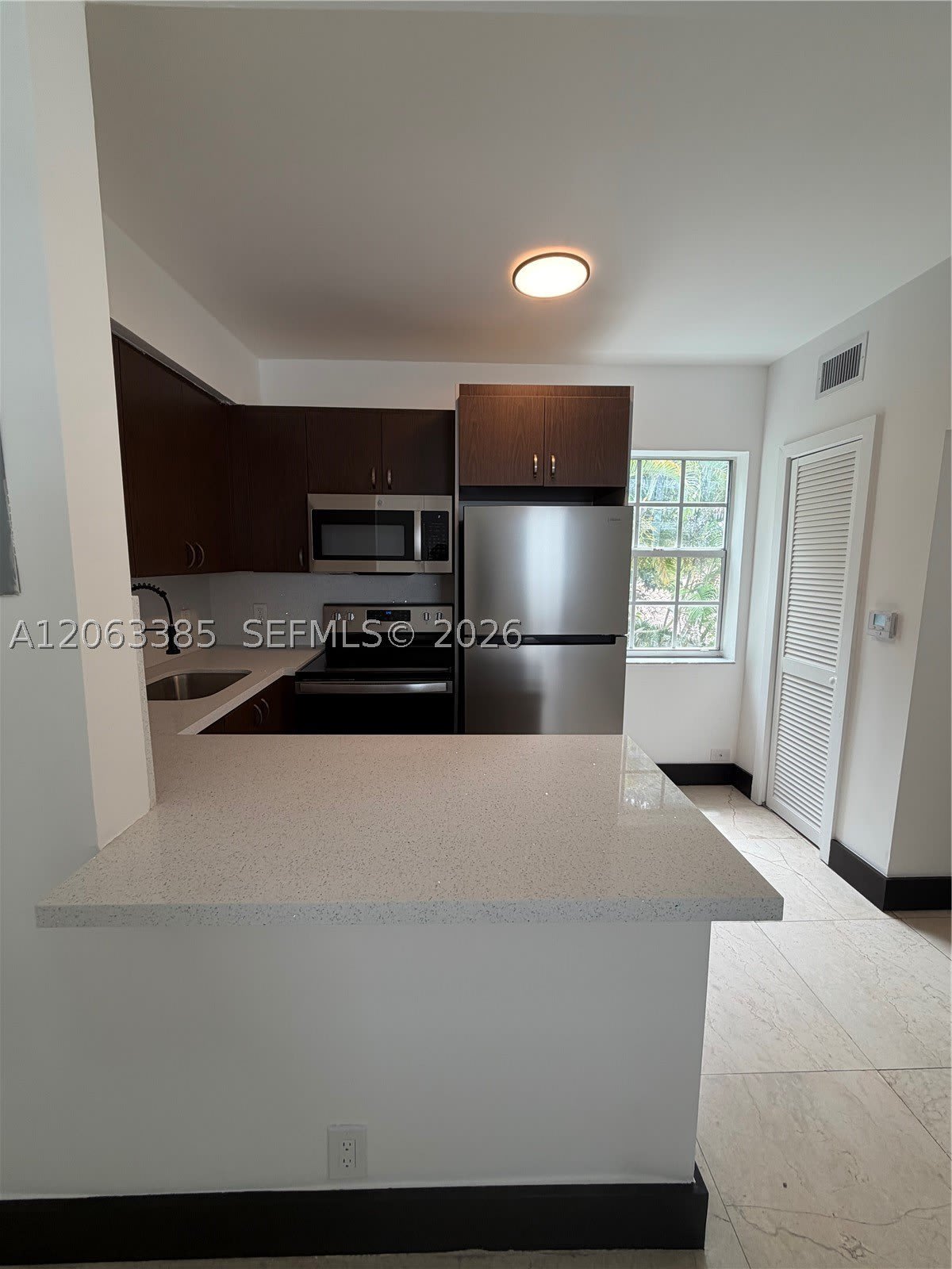 551 NE 62nd St – photo 4