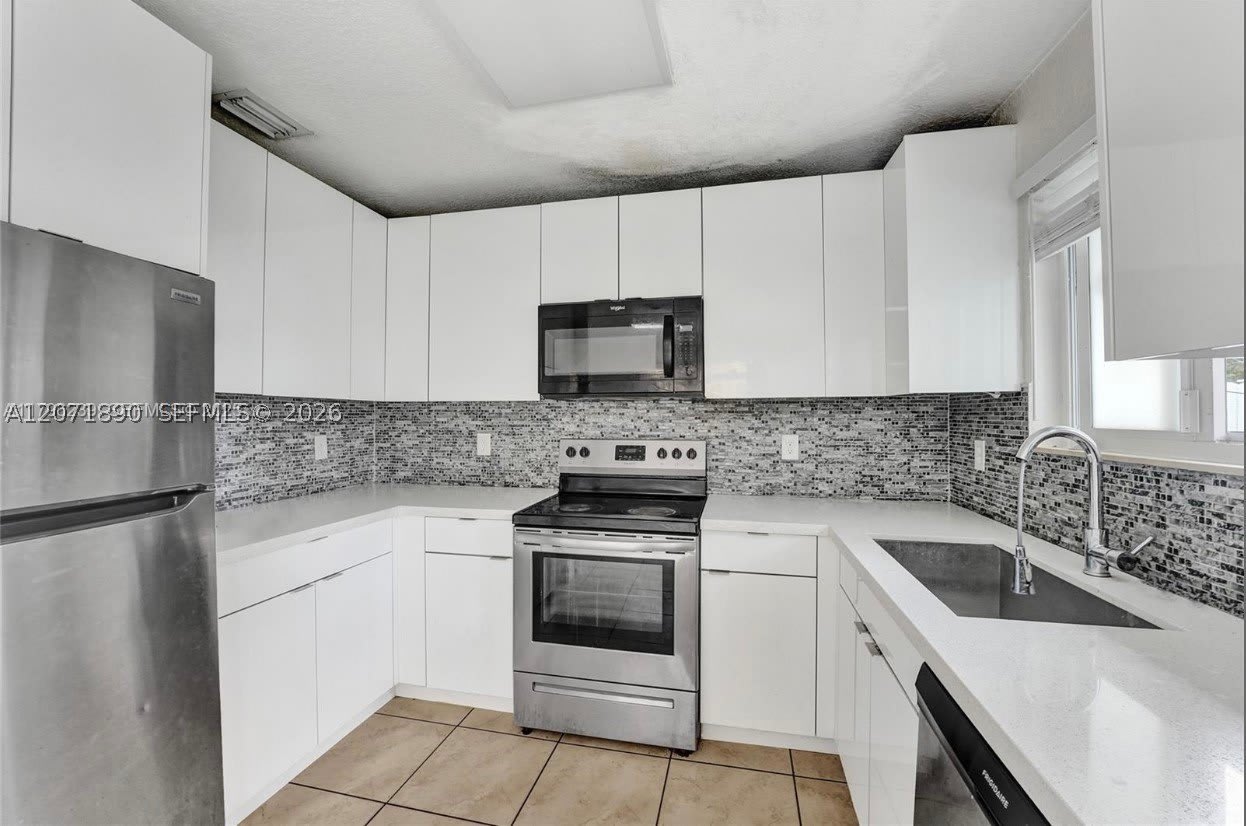 1154 NW 103 Street – photo 1