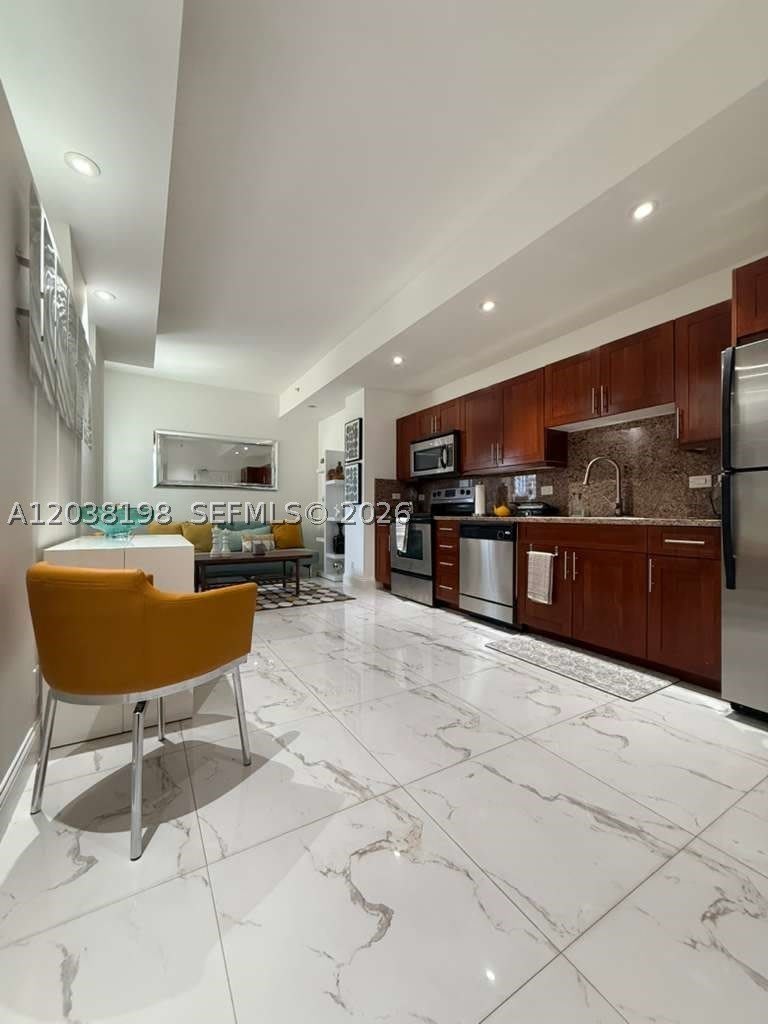 111 E Flagler St – photo 2