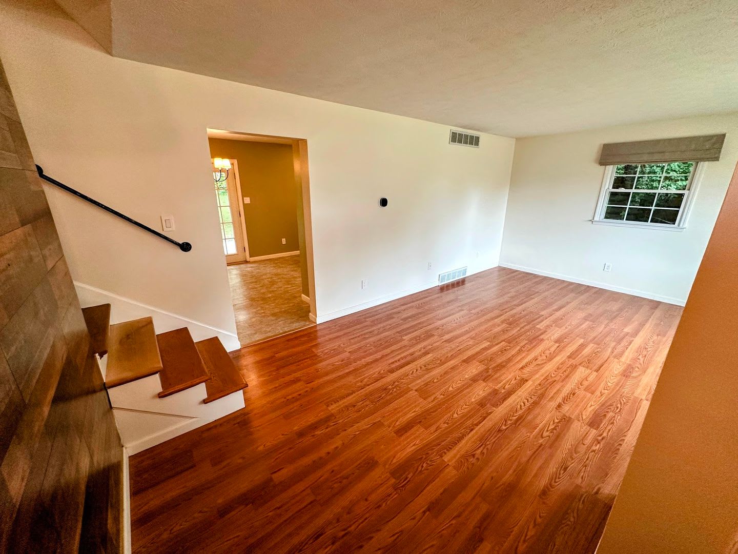 AVAILABLE NOW! Spacious 4 BR, 2 Bath House! Wood Floors, Attached Garage, W/D Included – photo 2