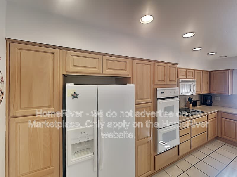 10730 W Tropicana Cir – photo 5