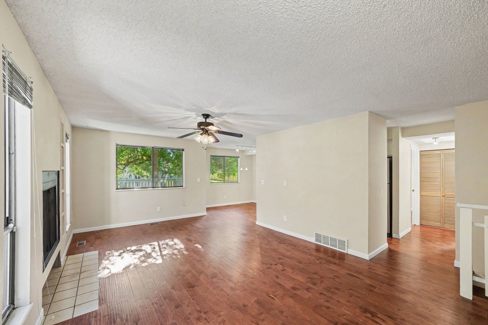 Spacious 2BR/2BA Corner Unit with Finished Basement, Private Patio & Garage – photo 4