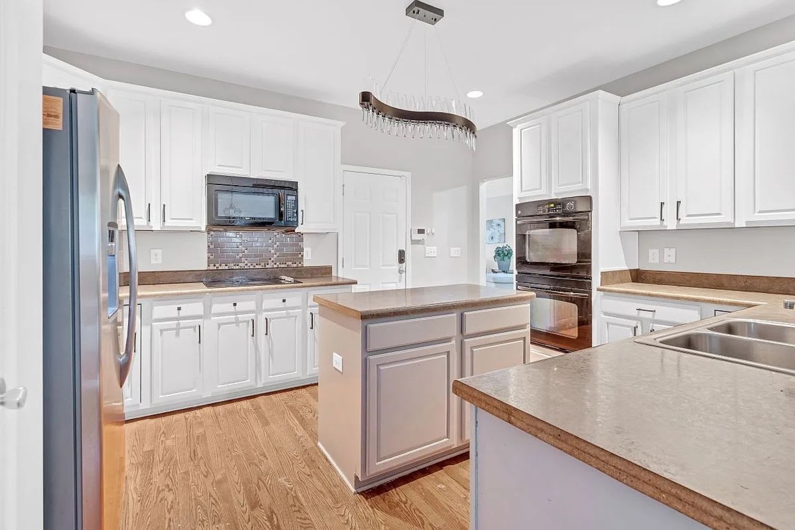 Room in 4 Bedroom Home at 5077 Stonewood Pines Dr – photo 5