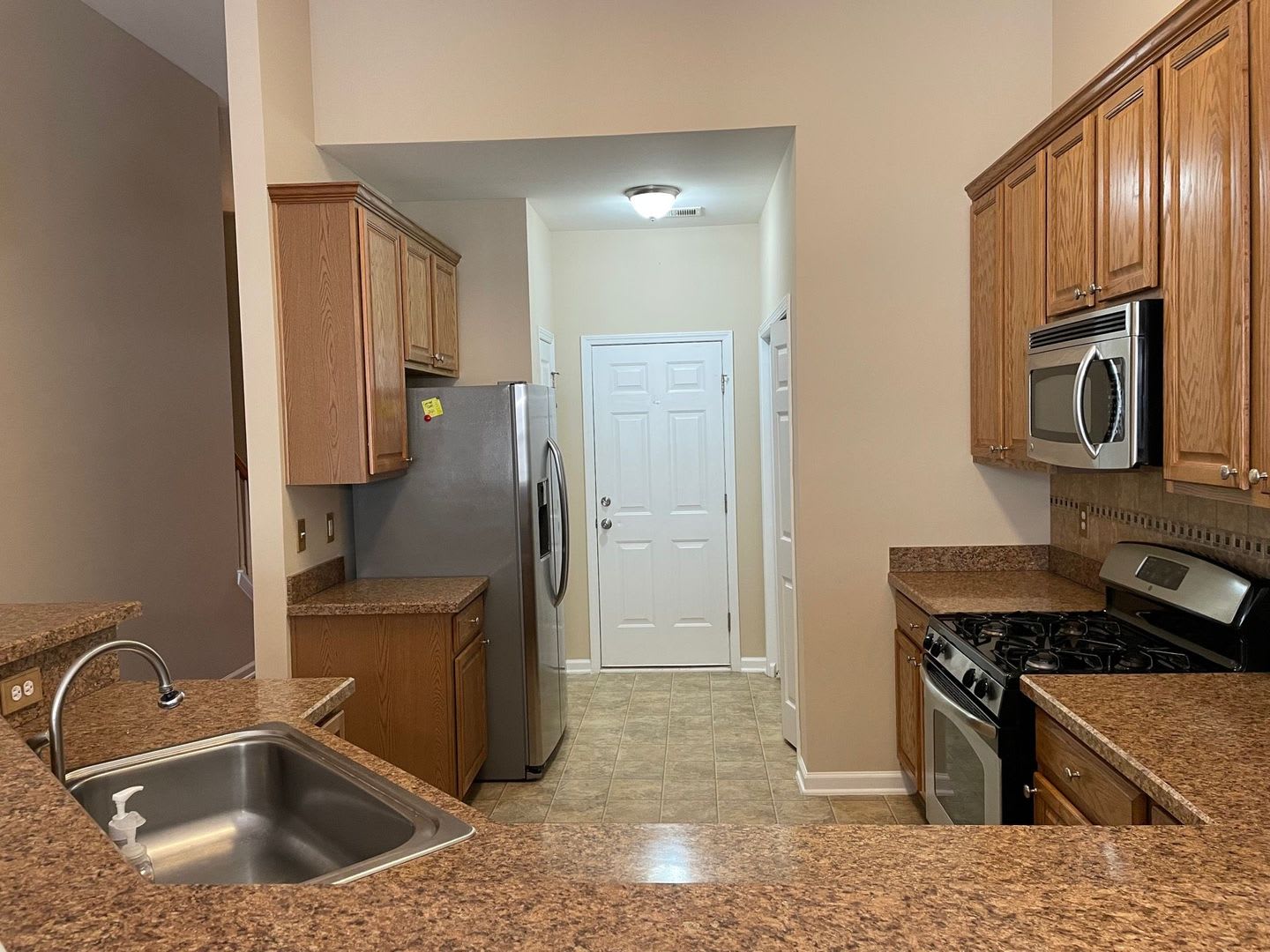 Very nice 4 bedroom/3 bath condo in Tuscany with fireplace, enclosed patio, 1 car garage – photo 3
