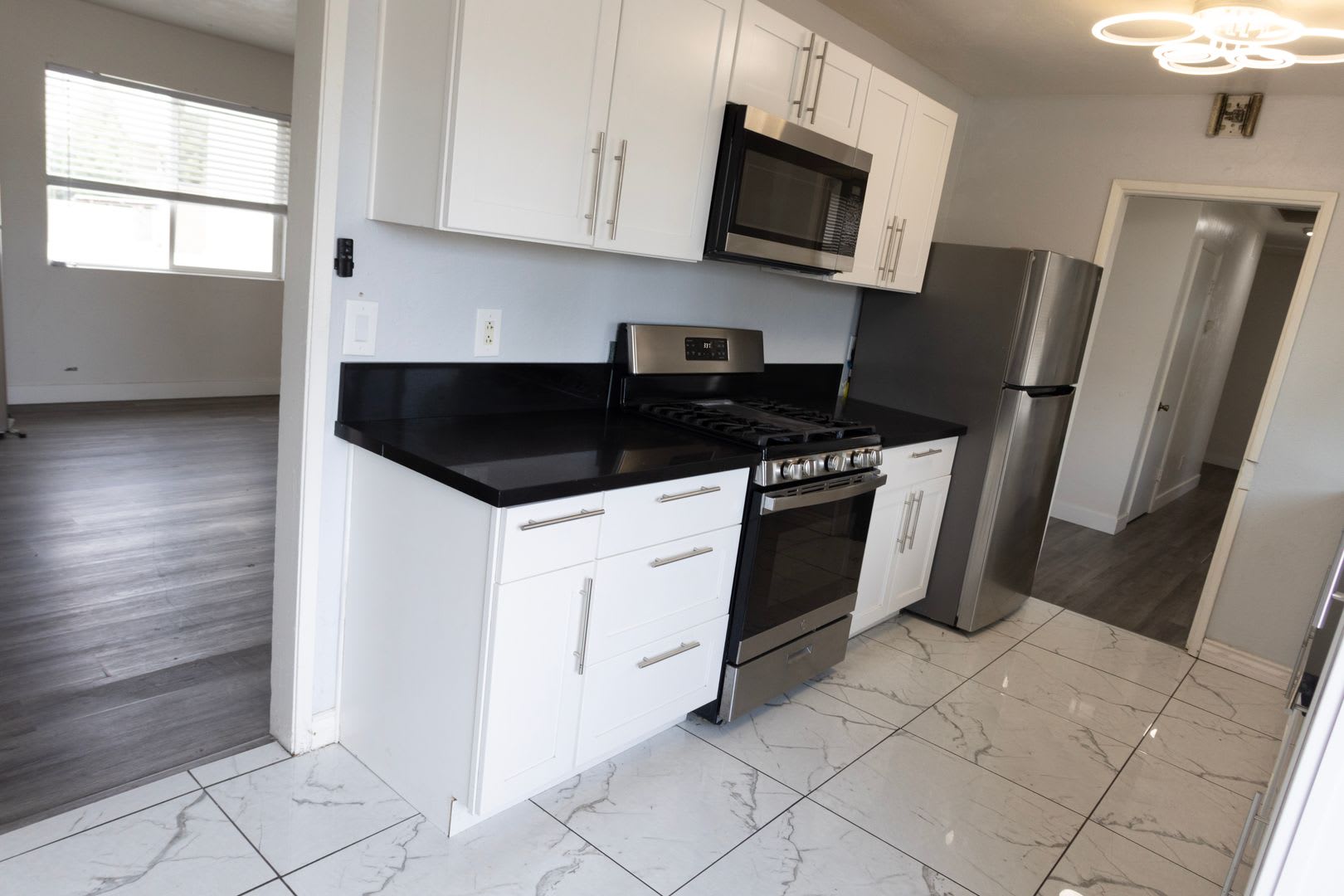 Across the street from Campus- 8 bedrooms priced at cost of A 6 bedroom! ACT Quick!- SHORT LEASE – photo 3