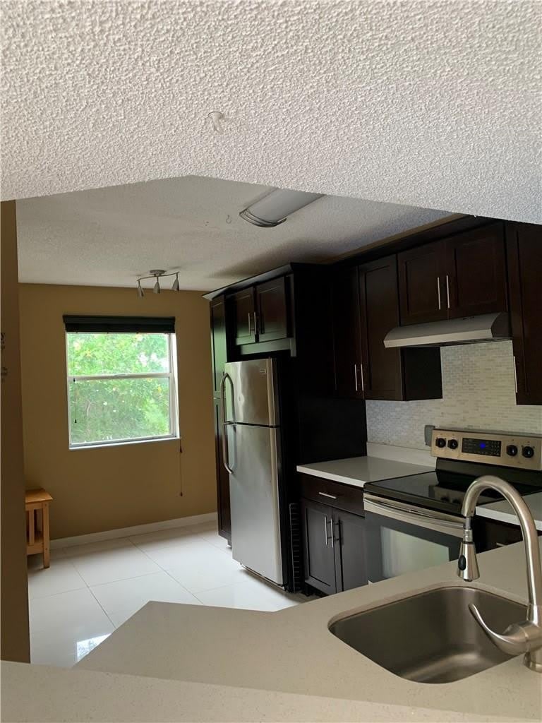 8891 Wiles Road – photo 1