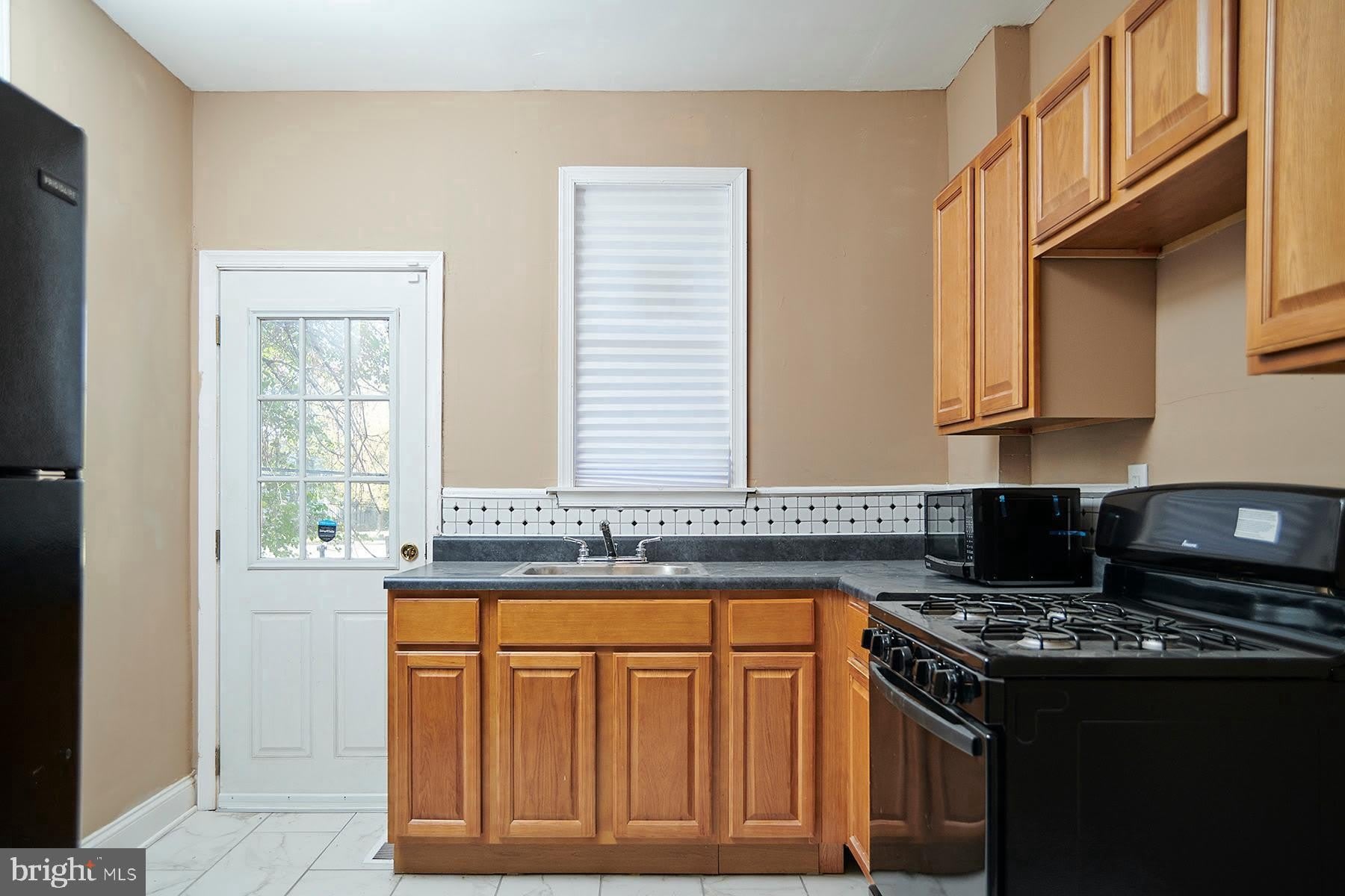6123 UPLAND Street – photo 1