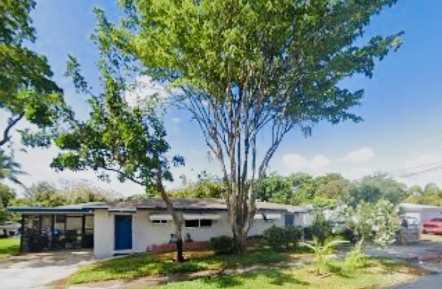721 Ne 12Th Avenue – photo 1